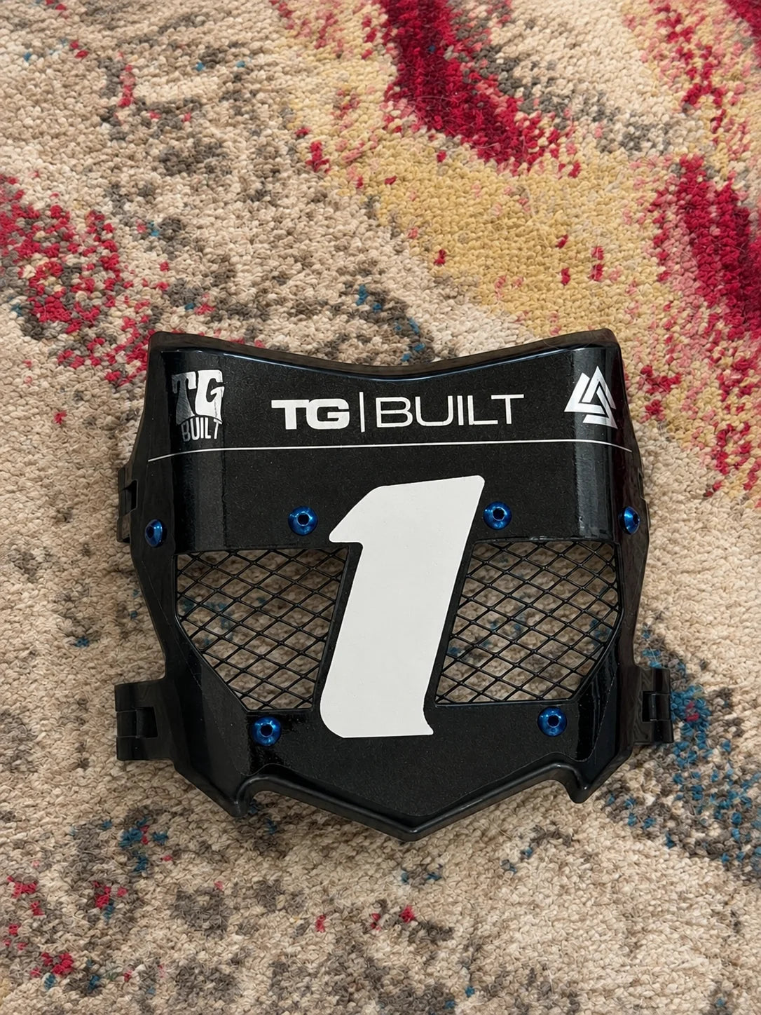 TG Built Titanium Vented Number Plate with blue titanium bolts